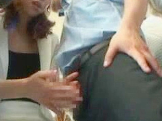 Slutty MILF sneaks a finger in her pussy in public in Tokyo, busted by a hot stud