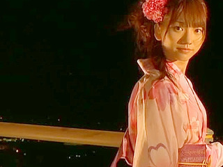 Sexually arousing Japanese teen Aki Takajo in a kimono reveals her tight nipples and fuckable thighs in Nippon porn.
